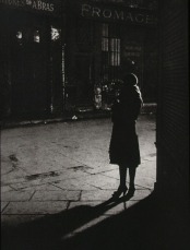 ''Prostitute au coin de la Rue de la Reynie avec la Rue Quincampoix'' - Brassaï, 1933